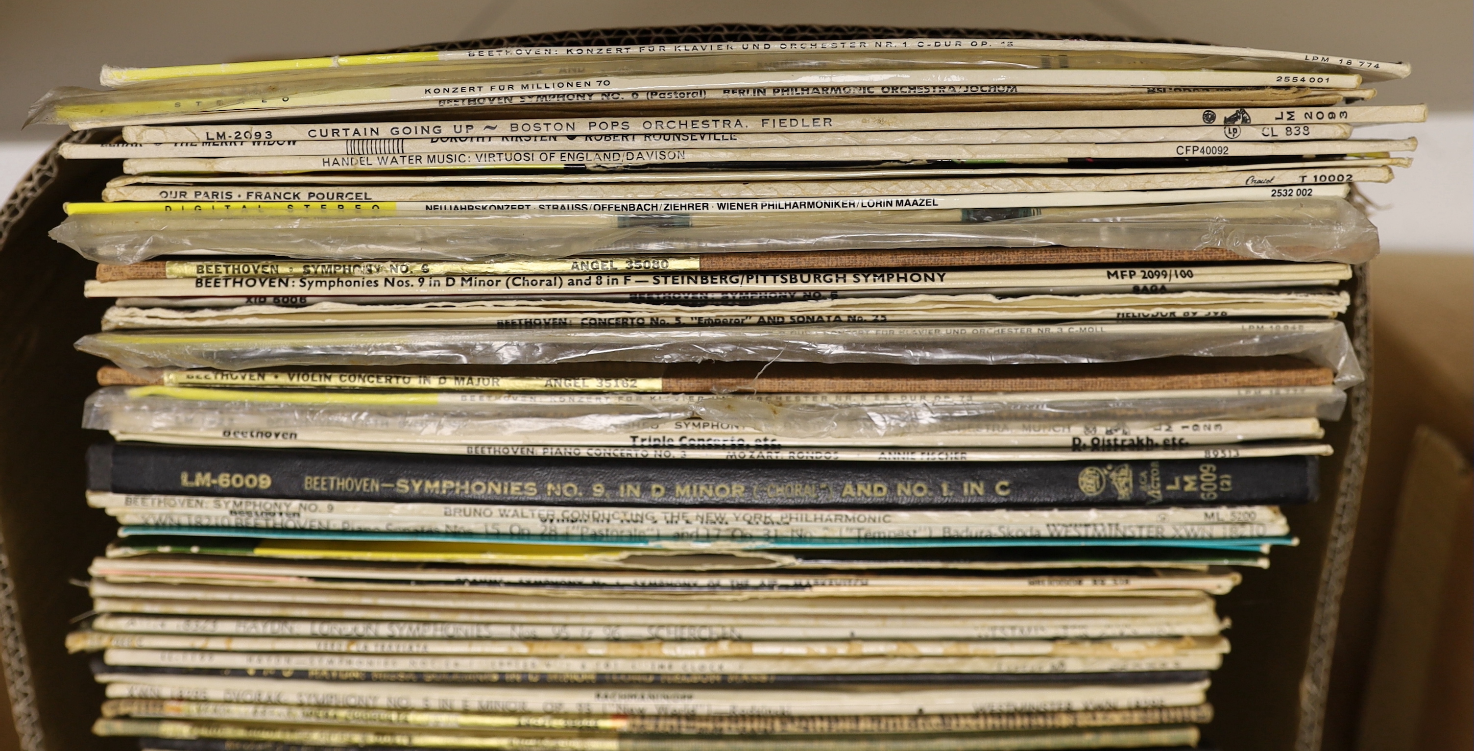 A collection of LPs including 1970's rock, classical recordings, box sets, etc, including; The Beatles, Queen, The Carpenters, Dionne Warwick, ABBA, Dave Brubeck, The Beach Boys, Haydn symphonies, Beethoven symphonies, o